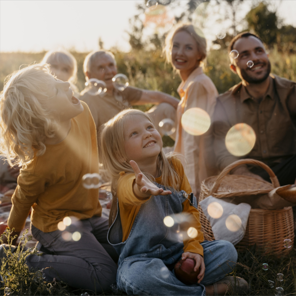 full-shot-happy-family-outdoors(1)